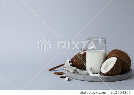 Coconut milk, concept of tasty and natural drink Coconut milk, concept of tasty and natural drink 112994365