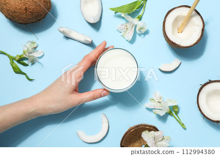 Coconut milk, concept of tasty and natural drink Coconut milk, concept of tasty and natural drink 112994380