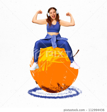 Motivated young woman in headphones sitting on apple and showing muscles, training on white background. Creative conceptual collage. 112994436