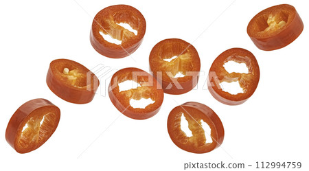 Sliced red hot chili peppers isolated on white background with clipping path Sliced red hot chili peppers isolated on white background with clipping path 112994759