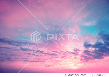 Colorful cloudy flaming purple sky at sunset. Gradient color. Sky texture. Abstract nature background Colorful cloudy flaming purple sky at sunset. Gradient color. Sky texture. Abstract nature background 112998398