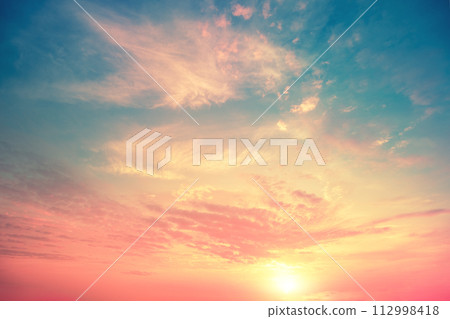 Colorful cloudy flaming sky at sunset. Gradient color. Sky texture. Abstract nature background Colorful cloudy flaming sky at sunset. Gradient color. Sky texture. Abstract nature background 112998418
