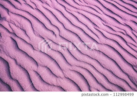 Abstract wavy sandy background. Beach sand texture 112998499