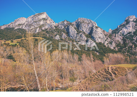 View of mountain range on a sunny day. National park Peaks of Europe (Picos de Europa). Teleferico Fuente De, Cantabria, Spain, Europe 112998521