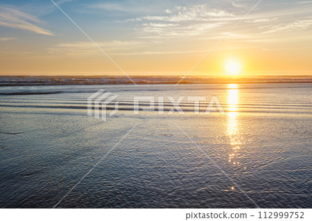 Atlantic ocean sunset with surging waves at Fonte da Telha beach, Portugal Atlantic ocean sunset with surging waves at Fonte da Telha beach, Portugal 112999752