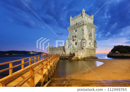 Belem Tower on the bank of the Tagus River in twilight. Lisbon, Portugal Belem Tower on the bank of the Tagus River in twilight. Lisbon, Portugal 112999765