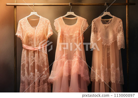 Used colorful clothes hanging on a rack. Used colorful clothes hanging on a rack. 113000897