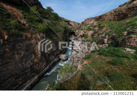 Panoramic view of Aksu River canyon in Kazakhstan in spring Panoramic view of Aksu River canyon in Kazakhstan in spring 113001231