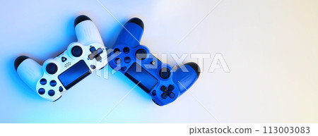 Gamepad on abstract background with light effects 113003083