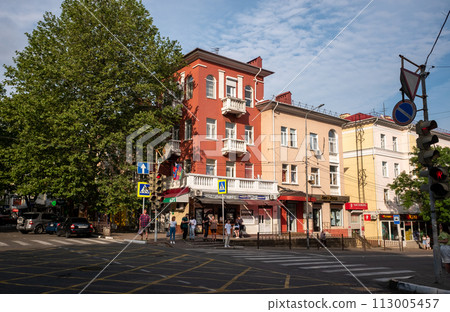 Pedestrian crossing at the intersection of streets in Tuapse on a summer day. Pedestrian crossing at the intersection of streets in Tuapse on a summer day. 113005457