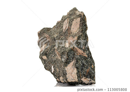 Macro stone mineral Diopside Calcite Magnetite on a white background 113005808