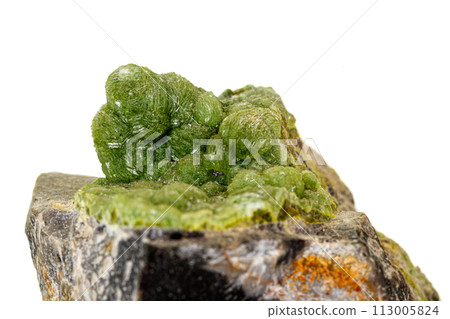 Macro pink Smithsonite mineral stone on microcline on white background Macro pink Smithsonite mineral stone on microcline on white background 113005824