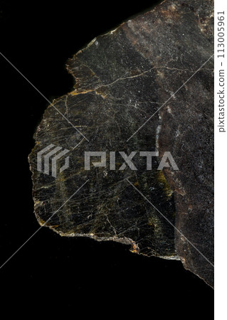Macro Diopside mineral stone on black background 113005961