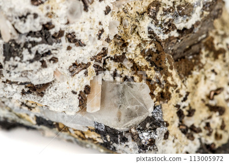 Macro stone Pyrite mineral in rock on a white background Macro stone Pyrite mineral in rock on a white background 113005972