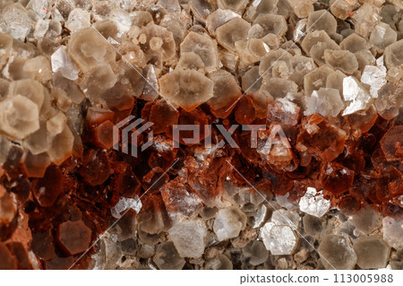 Macro stone Aragonite mineral on a black background Macro stone Aragonite mineral on a black background 113005988