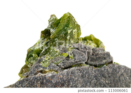 Macro stone Apatite mineral on white background Macro stone Apatite mineral on white background 113006061