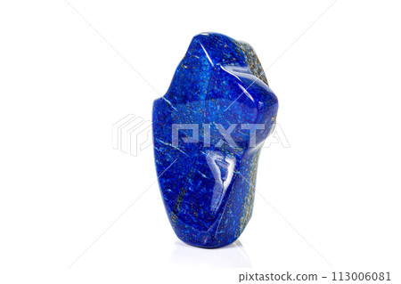 Macro of a mineral stone Lazurite on a white background Macro of a mineral stone Lazurite on a white background 113006081