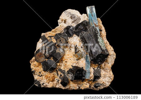 Macro stone mineral tourmaline aquamarine with a black background 113006189
