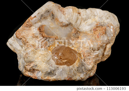 Macro tourmaline mineral stone on black Macro tourmaline mineral stone on black 113006193