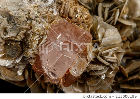 Macro stone Topaz mineral on a black background 113006199