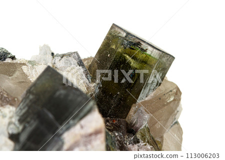 Macro tourmaline mineral stone on white background Macro tourmaline mineral stone on white background 113006203