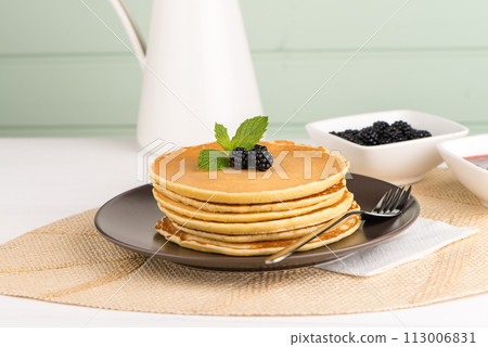 Pancakes with fresh blackberries 113006831
