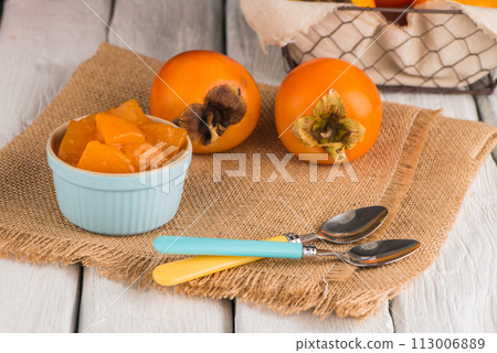 Orange persimmons 113006889