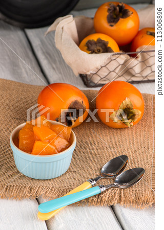 Orange persimmons Orange persimmons 113006896