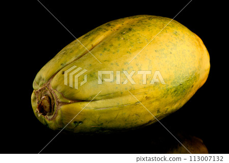 Papaya fruit on black background Papaya fruit on black background 113007132