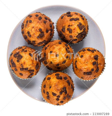 Muffins with chocolate chips on a ceramic plate 113007289