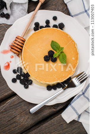 Pancakes with fresh blackberries 113007403