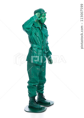 Man on a green toy soldier costume Man on a green toy soldier costume 113007599