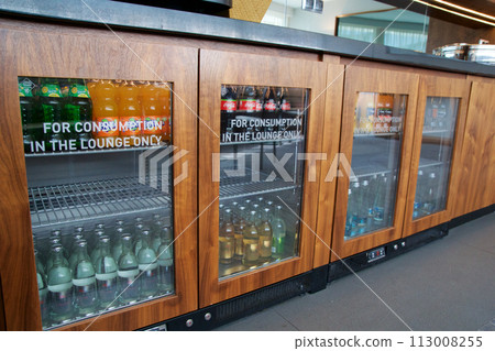 BRESLAU, POLAND - 15 JUN 2018: Refrigerators with various soft drinks in the executive lounge of a luxury hotel 113008255