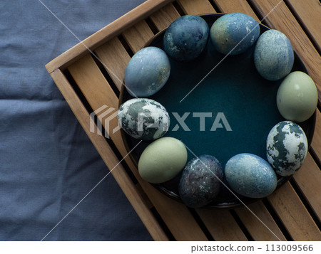 Blue painted easter eggs 113009566