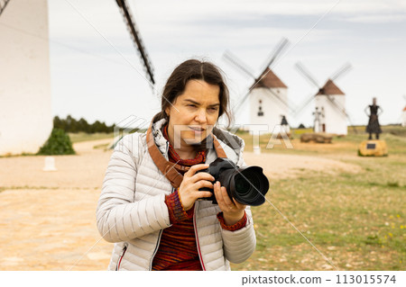 Tourist taking photo, Mota del Cuervo, Spain Tourist taking photo, Mota del Cuervo, Spain 113015574
