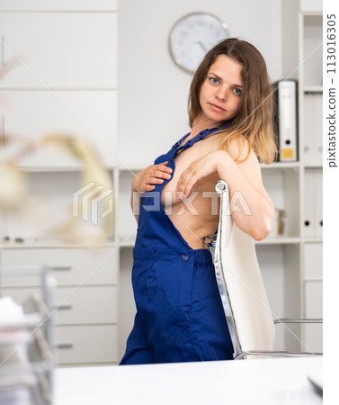 Naked female cleaning service worker in office 113016305