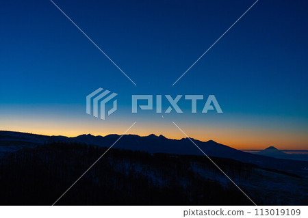 [Magic Hour] Magic Hour of Yatsugatake and Crescent Moon [Nagano Prefecture] 113019109