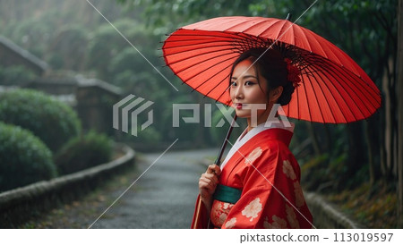 Portrait of a beautiful attractive Asian woman in traditional Japanese clothing, kimono, with an umbrella 113019597