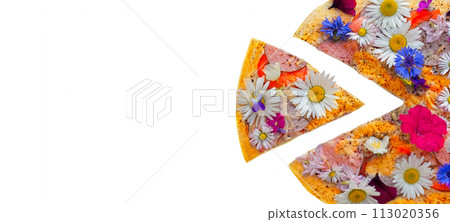 Creative pizza with a sliced slice topped with colorful flowers. Creative pizza with a sliced slice topped with colorful flowers. 113020356
