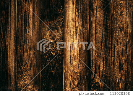 Wooden dark texture from boards closeup. Wooden dark texture from boards closeup. 113020398