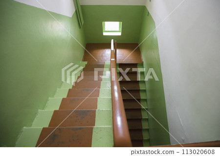 Green staircase in the office corridor. Green staircase in the office corridor. 113020608