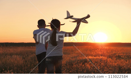 child airplane, children dream airplane pilot, child kid boy girl running with toy airplane across field, working team pilots, silhouette happy children running with toy airplanes hands, happy boy child airplane, children dream airplane pilot, child kid boy girl running with toy airplane across field, working team pilots, silhouette happy children running with toy airplanes hands, happy boy 113022584