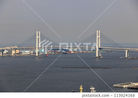 Views of Yokohama Minatomirai as seen from the Cosmo Clock 21 ferris wheel at the Cosmo World amusement park in minato mira 21 district of yokohama japan, originally the world's tallest ferris wheel. 113024168