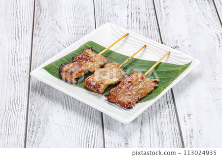 Thai cuisine - grilled pork skewer Thai cuisine - grilled pork skewer 113024935