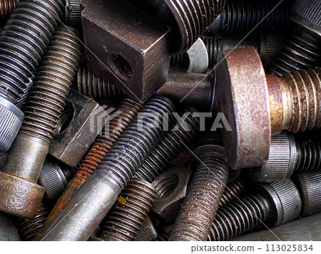 Detail of different metallic bolts and nuts in the toolbox 113025834