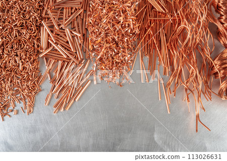 Copper scrap, raw material industry on metal background Copper scrap, raw material industry on metal background 113026631