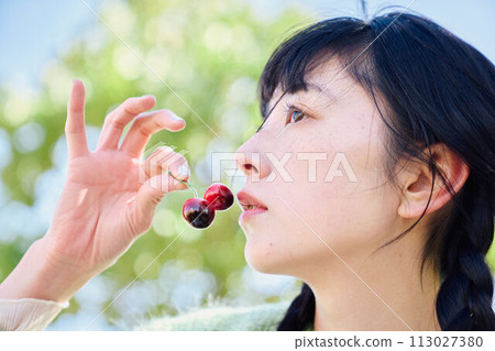 A woman with fruit A woman with fruit 113027380
