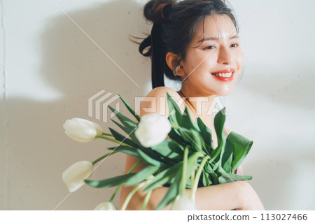 Beauty image of woman and flowers 113027466