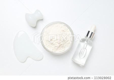Collagen powder in a bowl on a light background Collagen powder in a bowl on a light background 113028002
