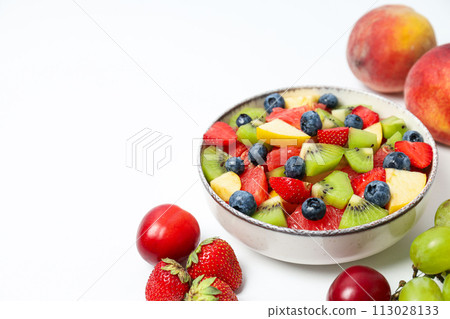 Tasty and healthy nutrition concept - fruit salad Tasty and healthy nutrition concept - fruit salad 113028133